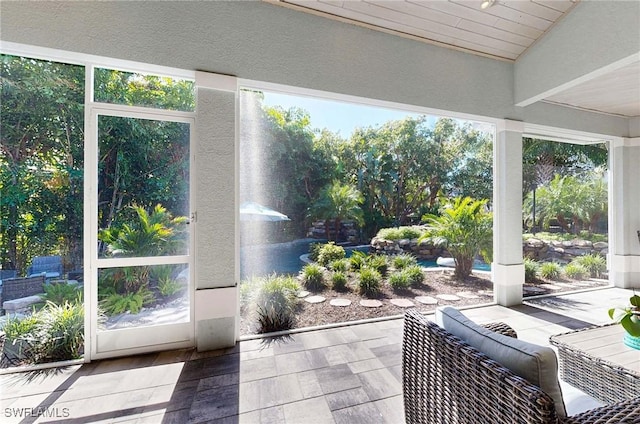 sunroom / solarium with a healthy amount of sunlight