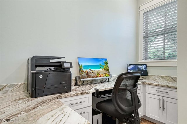 office space featuring built in desk