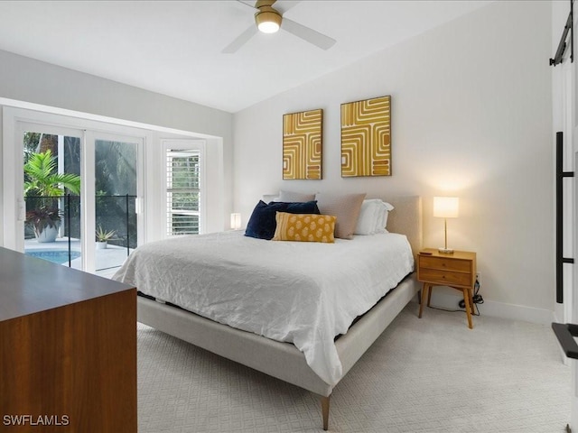 carpeted bedroom with ceiling fan, access to exterior, and vaulted ceiling