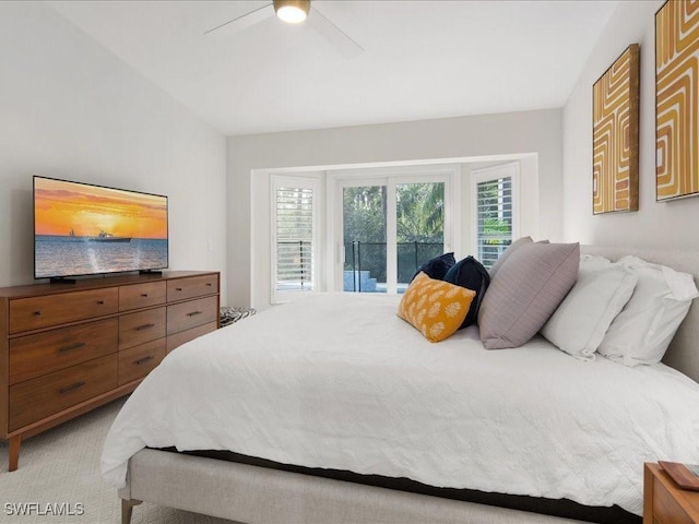 bedroom featuring ceiling fan, light colored carpet, and access to outside