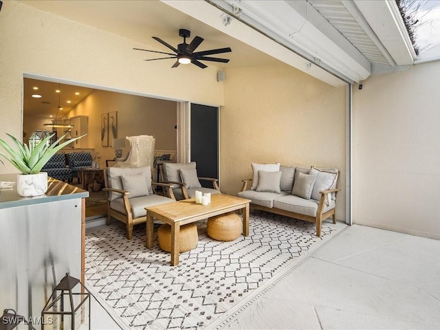 view of patio featuring an outdoor hangout area and ceiling fan