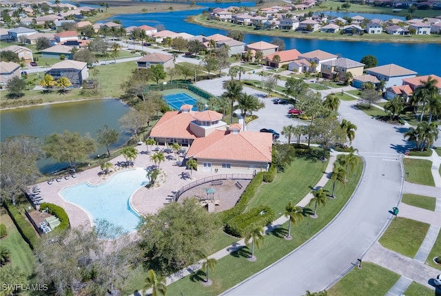 drone / aerial view with a water view