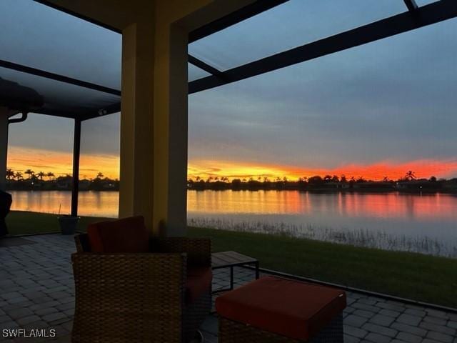 patio terrace at dusk with a water view