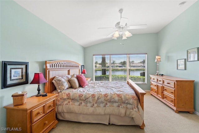 bedroom featuring light carpet, ceiling fan, and lofted ceiling