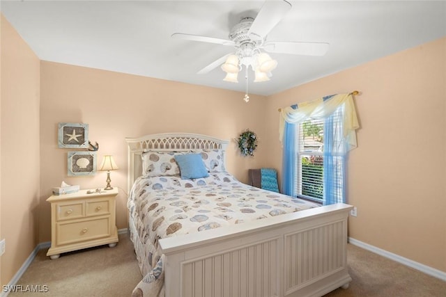 bedroom with light colored carpet and ceiling fan