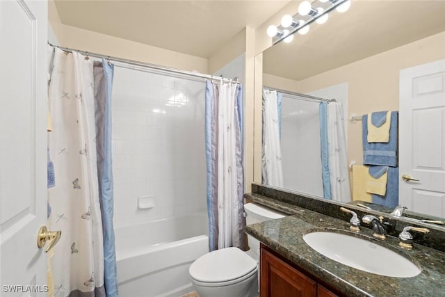 full bathroom with shower / tub combo with curtain, vanity, and toilet