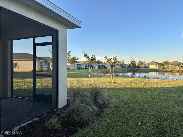 view of yard featuring a water view