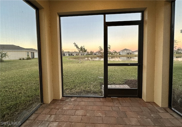 doorway to outside featuring plenty of natural light