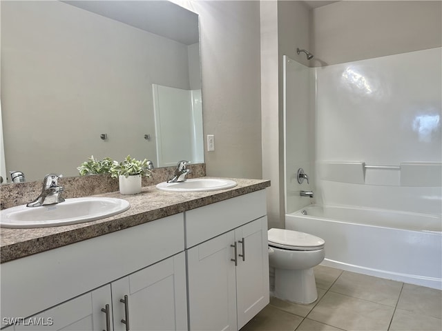 full bathroom with tile patterned flooring, vanity, shower / bath combination, and toilet