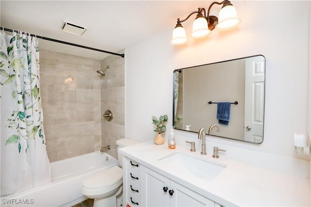 full bathroom featuring shower / bathtub combination with curtain, vanity, and toilet