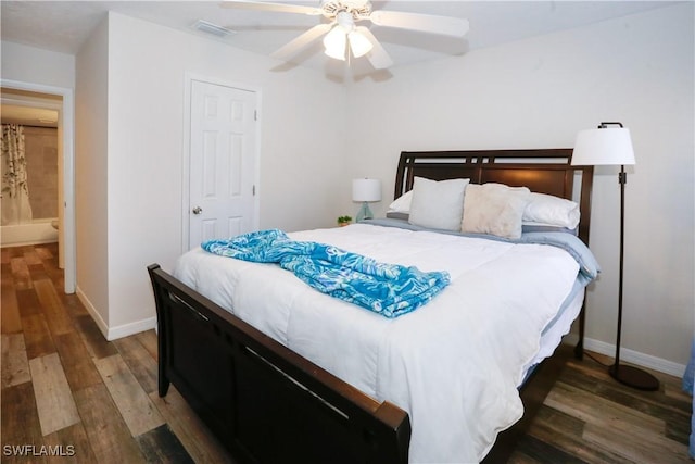 bedroom featuring dark hardwood / wood-style flooring and ceiling fan