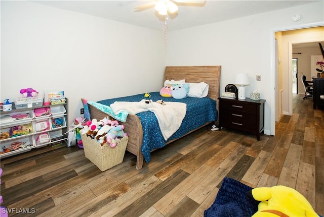 bedroom featuring ceiling fan and dark hardwood / wood-style flooring