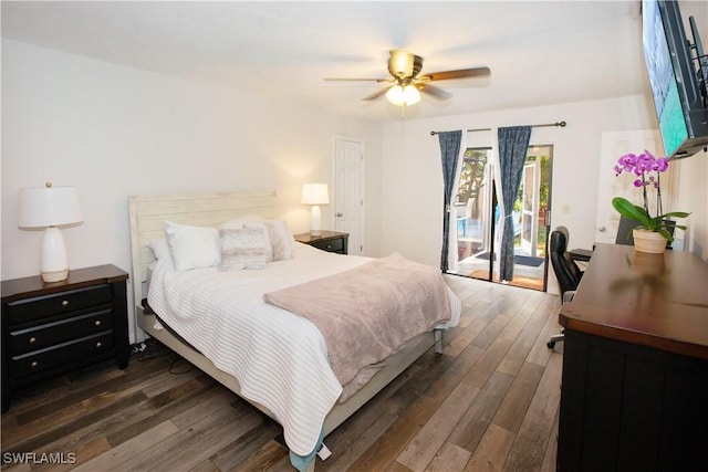 bedroom featuring access to exterior, dark hardwood / wood-style floors, and ceiling fan