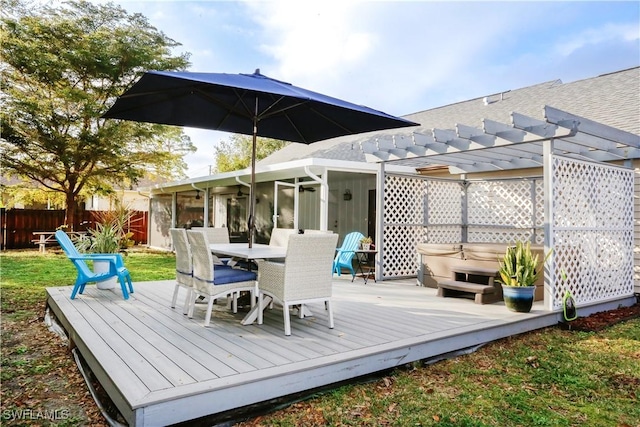 wooden deck with a pergola, a hot tub, and a sunroom