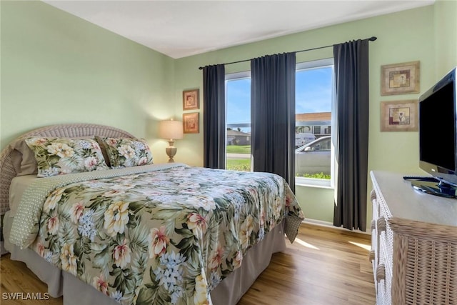 bedroom featuring light wood-type flooring