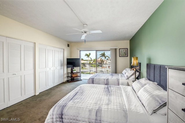 carpeted bedroom featuring a textured ceiling, access to outside, ceiling fan, and multiple closets