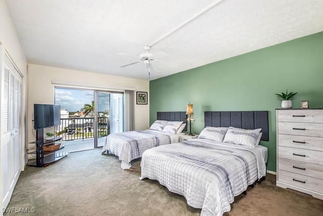 carpeted bedroom featuring a textured ceiling, a closet, access to outside, and ceiling fan