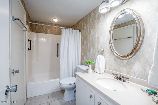 full bathroom with tile patterned flooring, shower / bath combination with curtain, vanity, and toilet