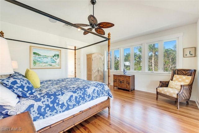 bedroom featuring hardwood / wood-style floors and ceiling fan