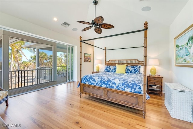 bedroom featuring light wood-type flooring, access to outside, vaulted ceiling, and ceiling fan