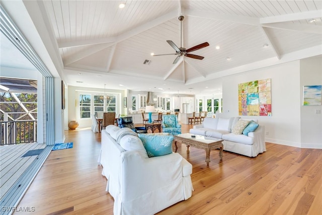 living room with light wood-type flooring and wood ceiling