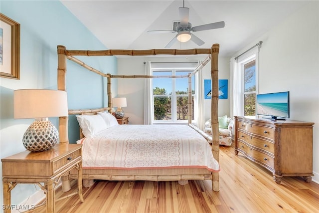 bedroom with light wood-type flooring, multiple windows, and ceiling fan