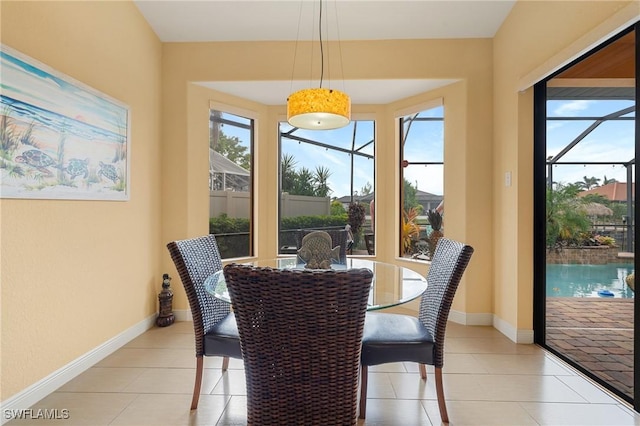 tiled dining space with a wealth of natural light