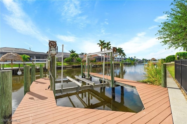 dock area featuring a water view