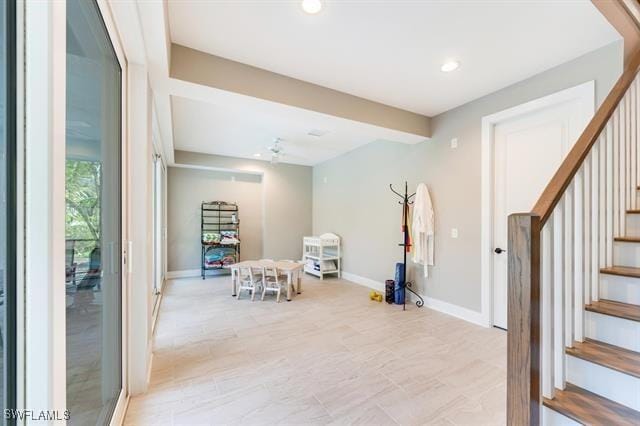 interior space featuring ceiling fan