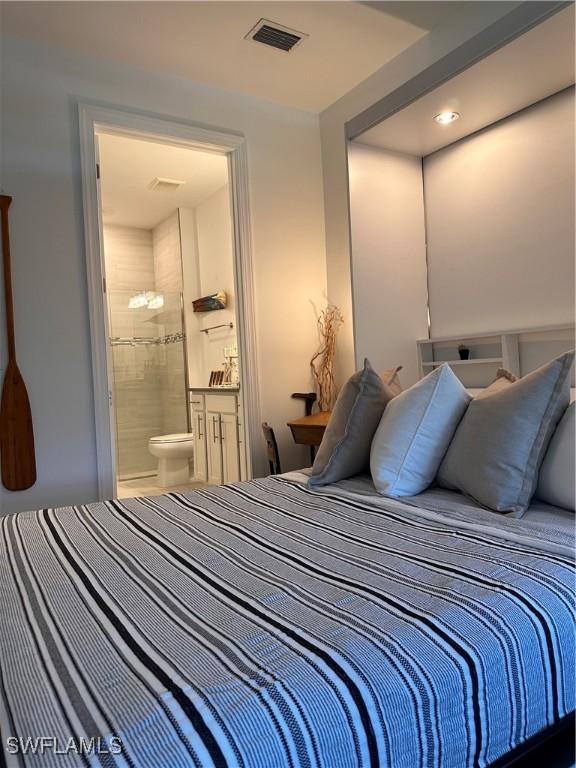 bedroom with ensuite bath