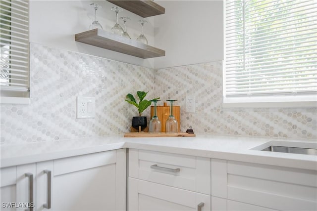 kitchen featuring white cabinets