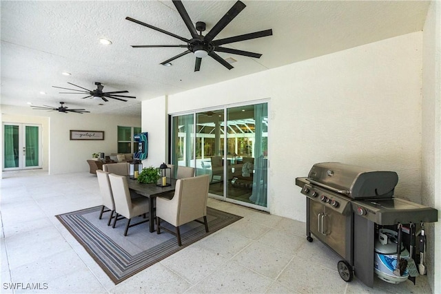 dining space with a textured ceiling