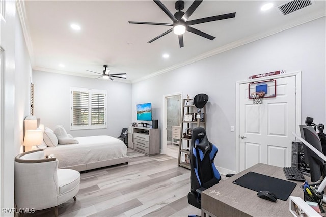 bedroom featuring ceiling fan, light hardwood / wood-style floors, and crown molding