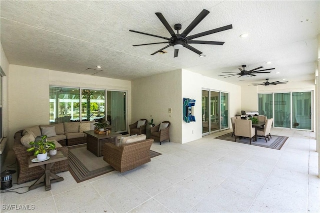 living room with a textured ceiling