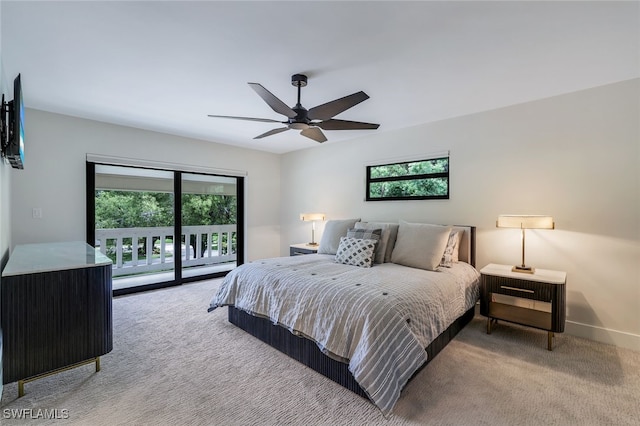 bedroom with ceiling fan, carpet floors, access to outside, and multiple windows