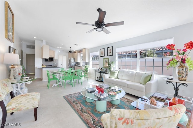 living room featuring ceiling fan