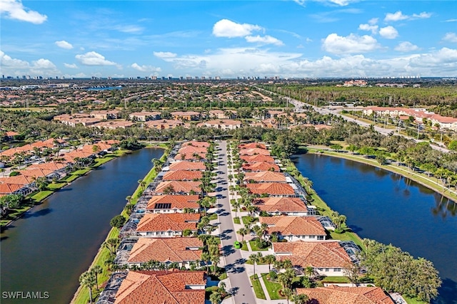 drone / aerial view featuring a water view