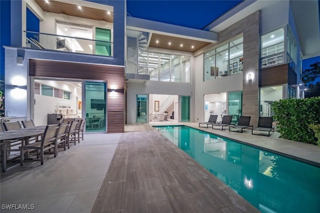 outdoor pool with a patio