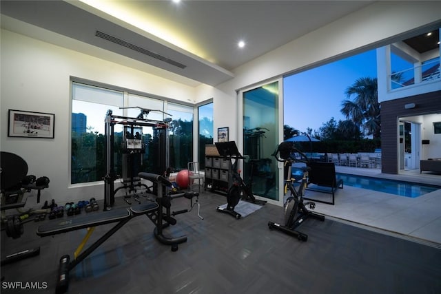 workout area with plenty of natural light and visible vents