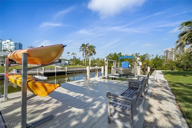 view of dock with a water view and boat lift