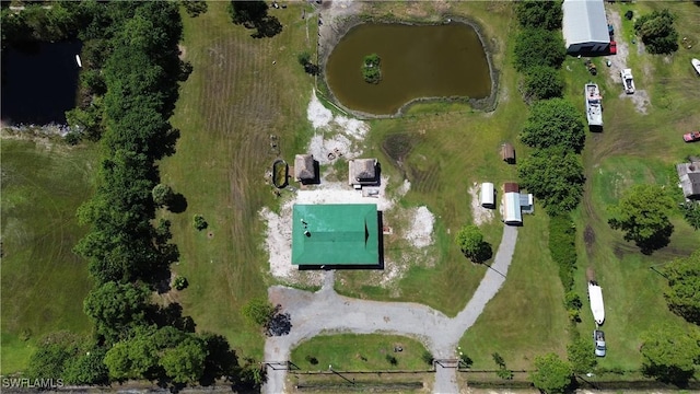 drone / aerial view featuring a rural view and a water view