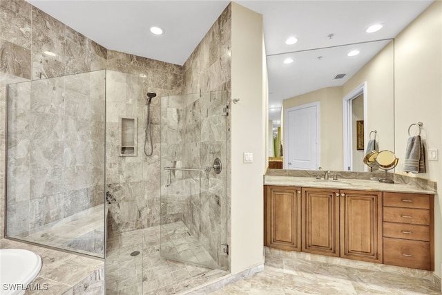 bathroom featuring vanity and plus walk in shower