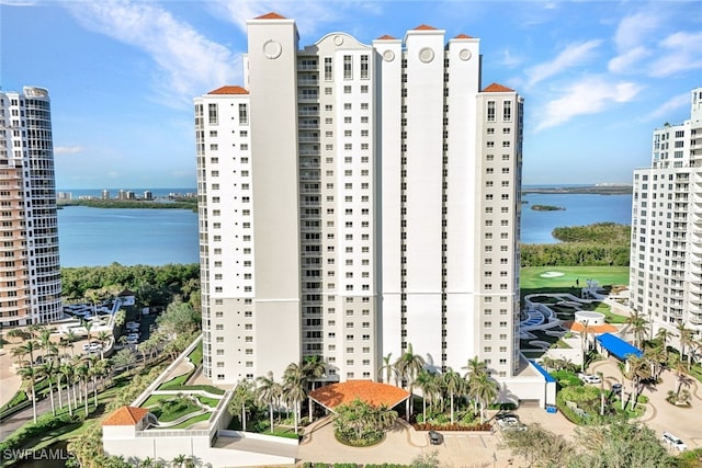 view of building exterior featuring a water view