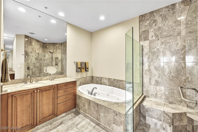 bathroom featuring vanity, tile walls, and plus walk in shower