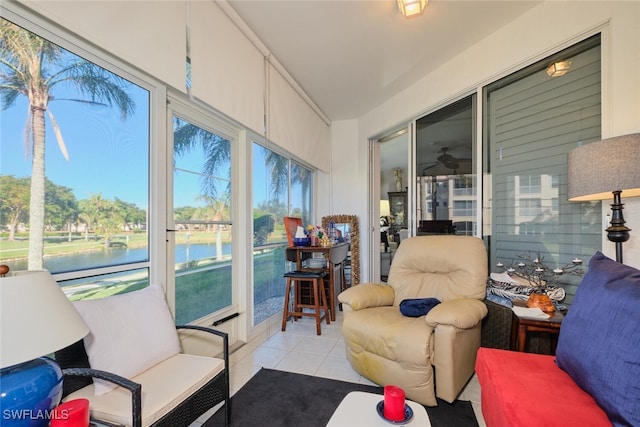 sunroom with a water view