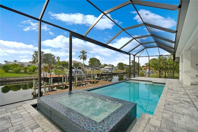 view of pool with a boat dock, a water view, and a lanai