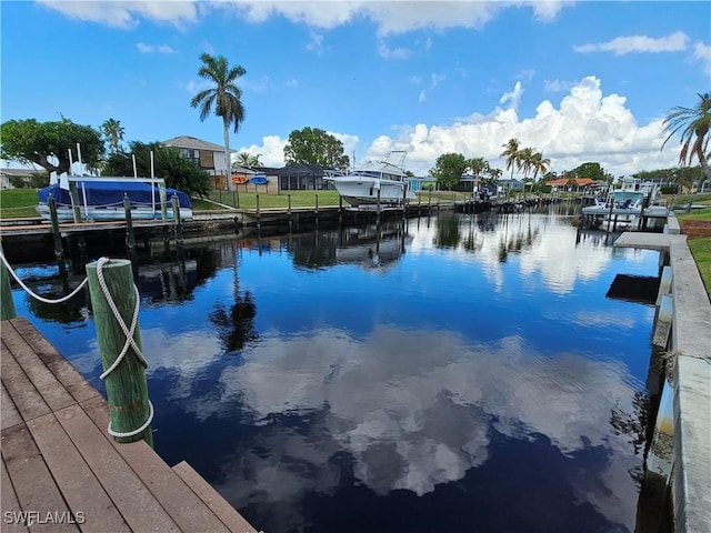 view of dock with a water view