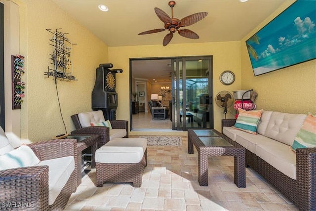 living room featuring ceiling fan