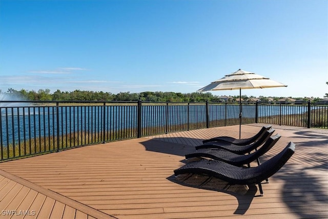 deck featuring a water view