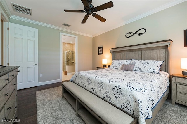 bedroom with crown molding, ensuite bathroom, ceiling fan, and dark hardwood / wood-style flooring